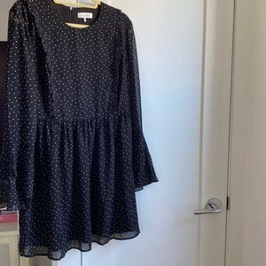 LEYDEN Flowy black polka dot dress with sheer butterfly sleeves